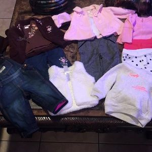 12 pieces. Sets are 3 to 6 mths the rest is 6 mths